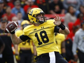 Maryland quarterback Max Bortenschlager throws to a receiver in the first half of an NCAA college football game against Indiana in College Park, Md., Saturday, Oct. 28, 2017. (AP Photo/Patrick Semansky)