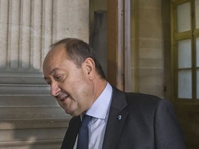Bernard Squarcini former intelligence chief arrives at courthouse in Paris, France, Thursday, Oct. 19, 2017. A French ex-intelligence chief is expected to addresses failures in tracking Islamic extremists, at the trial over deadly 2012 attacks on a Jewish school and French soldiers. (AP Photo/Michel Euler)