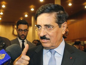 Hamad bin Abdulaziz al-Kawari, Qatar's candidate for the post of the new UNESCO chief gives the a thumb's up as he he speaks to the media after the fourth vote by secret ballot at the UNESCO headquarters in Paris, France, Thursday, Oct. 12, 2017. The United States is pulling out of UNESCO because of what Washington sees as its anti-Israel bias and a need for "fundamental reform" of the U.N. cultural agency. (AP Photo/Michel Euler)