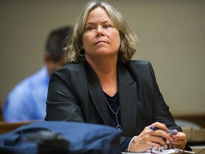 Dr. Eden Wells, chief medical executive of the Michigan Department of Health and Human Services, appears in court for the first day of her preliminary examination on Monday, Oct. 9, 2017, in District Court in Flint, Mich. The hearing was postponed when prosecutors said they would add a charge of involuntary manslaughter. (Terray Sylvester/The Flint Journal-MLive.com via AP)