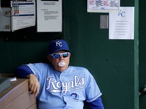 Kansas City Royals manager Ned Yost sits in the dugout before a baseball game between the Kansas City Royals and the Arizona Diamondbacks Sunday, Oct. 1, 2017, in Kansas City, Mo. (AP Photo/Charlie Riedel)