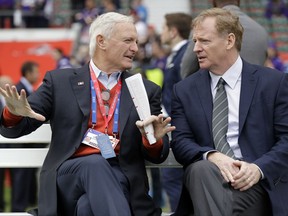 Cleveland Browns owner Jimmy Hallam, left, speaks to NFL Commissioner Roger Goodell before an NFL football game between the Cleveland Browns and the Minnesota Vikings at Twickenham Stadium in London, Sunday Oct. 29, 2017. (AP Photo/Matt Dunham)