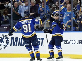 St. Louis Blues' Jaden Schwartz, right, is congratulated by Vladimir Tarasenko, of Russia, after scoring during the first period of an NHL hockey game Wednesday, Oct. 18, 2017, in St. Louis. (AP Photo/Jeff Roberson)