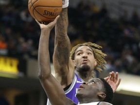 Sacramento Kings center Willie Cauley-Stein (00) blocks the shot of Indiana Pacers guard Victor Oladipo (4) during the second half of an NBA basketball game in Indianapolis, Tuesday, Oct. 31, 2017. The Pacers defeated the Kings 101-83. (AP Photo/Michael Conroy)