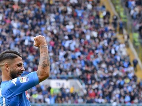 Napoli's Lorenzo Insigne celebrates after scoring during the Serie A soccer match between Napoli and Sassuolo, at the San Paolo stadium in Naples, Italy, Sunday, Oct. 29, 2017. (Ciro Fusco/ANSA via AP)