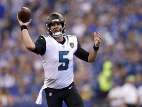 Jacksonville Jaguars quarterback Blake Bortles (5) throws against the Indianapolis Colts during the first half NFL football game in Indianapolis, Sunday, Oct. 22, 2017. (AP Photo/Jeff Roberson)