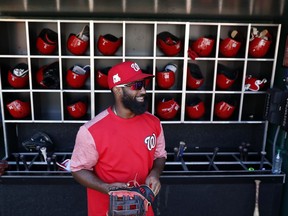 Washington Nationals' Brian Goodwin grabs his glove during practice at Nationals Park, Tuesday, Oct. 3, 2017, in Washington. Game 1 of the National League Division Series against the Chicago Cubs is Friday. (AP Photo/Alex Brandon)