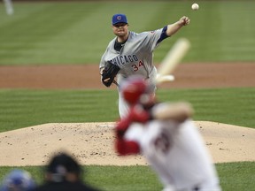 Chicago Cubs starting pitcher Jon Lester throws during the first inning of Game 2 of baseball's National League Division Series against the Washington Nationals, at Nationals Park, Saturday, Oct. 7, 2017, in Washington. (Patrick Smith/Pool Photo via AP)