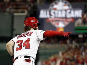 Washington Nationals' Bryce Harper runs the bases for his two-run home run in the eighth inning in Game 2 of baseball's National League Division Series against the Chicago Cubs, at Nationals Park, Saturday, Oct. 7, 2017, in Washington. (AP Photo/Alex Brandon)