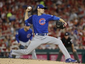 Chicago Cubs starting pitcher Kyle Hendricks throws against the Washington Nationals in the first inning of Game 1 of baseball's National League Division Series, at Nationals Park, Friday, Oct. 6, 2017, in Washington. (AP Photo/Pablo Martinez Monsivais)