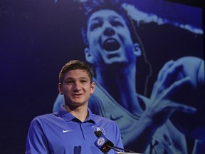 Duke's Grayson Allen answers a question during the Atlantic Coast Conference men's NCAA college basketball media day in Charlotte, N.C., Wednesday, Oct. 25, 2017. (AP Photo/Chuck Burton)