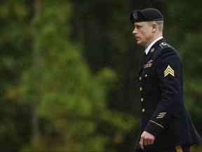 Sgt. Bowe Bergdahl returns to the Fort Bragg courthouse after a lunch break on Monday, Oct. 16, 2017, on Fort Bragg, N.C. Bergdahl, who walked off his base in Afghanistan in 2009 and was held by the Taliban for five years, is charged with desertion and misbehavior before the enemy. (Andrew Craft/The Fayetteville Observer via AP)