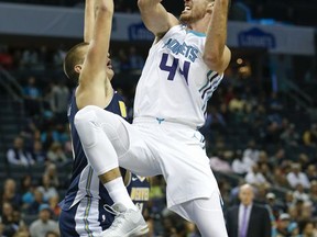 Charlotte Hornets forward Frank Kaminsky (44) goes up for a basket while facing the Denver Nuggets during the first half of an NBA basketball game, Wednesday, Oct. 25, 2017, in Charlotte, N.C. (AP Photo/Jason E. Miczek)