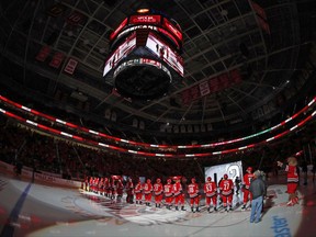 The Carolina Hurricanes players are introduced at a pregame ceremony prior to their first home game of the season against the Minnesota Wild, Saturday, Oct. 7, 2017, in Raleigh, N.C. (AP Photo/Karl B DeBlaker)