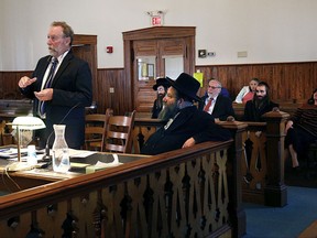 During a hearing at Orange Superior Court in Chelsea, Vt., on Wednesday, Oct. 18, 2017, defense attorney Robert Appel, left, argues there is no probable cause to charge his client Rabbi Berl Fink with a charge of attempting to elude police during an Aug. 7 traffic stop on Interstate 91 in Fairlee, Vt. Appel's motion was denied and Fink entered a not guilty plea. He is accused of failing to stop for suspected speeding for more than 4 miles on Interstate 91 in Thetford on the night of Aug. 8.  (Geoff Hansen/The Valley News via AP)