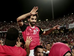 Egypt's Mohamed Salah celebrates defeating Congo during the 2018 World Cup group E qualifying soccer match at the Borg El Arab Stadium in Alexandria, Egypt, Sunday, Oct. 8, 2017. Egypt won 2-1. (AP Photo/Nariman El-Mofty)