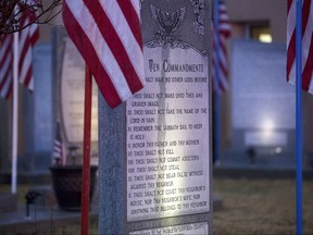 The Bloomfield Ten Commandments memorial is pictured, Monday, Feb. 13, 2017 at Bloomfield City Hall in Bloomfoeld,, N.M The U.S. Supreme Court on Monday, Oct. 16, 2017, sided with a lower court, the the 10th U.S. Circuit Court of Appeals, that ordered Bloomfield to remove a Ten Commandments monument from the lawn outside City Hall. (Jon Austria/The Daily Times via AP)