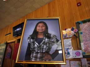 This May 6, 2016 file photo shows a portrait of Ashlynne Mike on display inside the lobby of the Farmington Civic Center in Farmington, N.M. Tom Begaye, who pleaded guilty to murder and sexual assault in the death of 11-year-old Ashlynne Mike on the largest American Indian reservation, is set to be sentenced. Begaye is scheduled Friday, Oct. 20, 2017 to receive life in prison for the May 2016 killing that prompted calls to expand the Amber Alert system and the death penalty to tribal communities across the U.S. (Jon Austria/The Daily Times via AP, File)