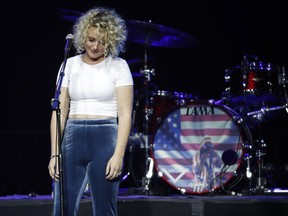 Cam performs during a benefit concert honoring first responders and those affected by the recent mass shooting, Thursday, Oct. 19, 2017, in Las Vegas. (AP Photo/John Locher)