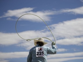 In this Sept. 23, 2017, photo, Carla Bryant warms up before competing in the mounted break-away roping event at the Bighorn Rodeo in Las Vegas. Formed in 1985, the International Gay Rodeo Association hosts several events across the U.S. raising money for charities. (AP Photo/John Locher)