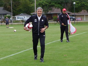 Canadian national men's soccer team coach Octavio Zambrano walks off the pitch at a practice in Alliston, Ont., Wednesday, Oct.4, 2017. Canada plays an international friendly against El Salvador in Houston on Saturday. THE CANADIAN PRESS/Neil Davidson