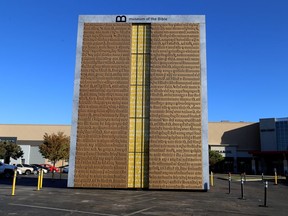 In this Saturday, Oct. 28, 2017 photo provided by Museum of the Bible, a full-scale replica of the Gutenberg Gates is displayed in Oklahoma City as part of a five-city tour before the gates are installed as an entrance to the Museum of the Bible in Washington, DC.  The gates will be on display Saturday and Sunday afternoons in Oklahoma City before moving to New York, then to Washington, where the Museum of the Bible is to open Nov. 17.  (Wendy Stubbs/Museum of the Bible via AP)