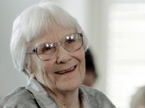 FILE - In this Aug. 20, 2007, file photo, author Harper Lee smiles during a ceremony honoring the four new members of the Alabama Academy of Honor at the Capitol in Montgomery, Ala.   A batch of letters hand written by "To Kill a Mockingbird" author Harper Lee has sold for more than $12,000. A statement from the Los Angeles-based Nate D. Sanders Auctions says 38 letters from the deceased novelist to friend Felic Itzkoff went for $12,500 in a sale held Thursday, Oct. 26, 2017.  (AP Photo/Rob Carr, File)