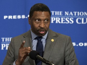 FILE - In this Aug. 29, 2017, file photo, Derrick Johnson speaks at a National Press Club (NPC) in Washington.  The NAACP has decided to hire its interim leader, Derrick Johnson, as its 19th president and CEO. The board of directors of the nation's oldest civil rights organization made the decision on Saturday, Oct. 21, 2017.  (AP Photo/Susan Walsh, File)