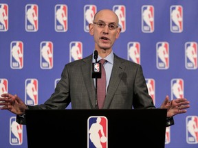 FILE - In this Sept. 28, 2017, file photo, NBA Commissioner Adam Silver speaks during a news conference in New York. Silver's NBA has had a frenetic offseason filled with more drama than the games themselves, particularly regular season contests. A fourth straight year of the same NBA Finals matchup seems likely, and even Michael Jordan was quoted as saying he fears an NBA where 28 teams are going to be "garbage." (AP Photo/Julie Jacobson)