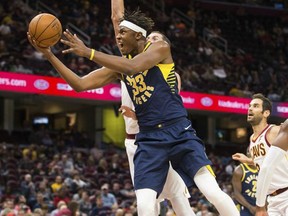 FILE - In this Oct. 6, 2017, file photo, Indiana Pacers' Myles Turner (33) takes a shot against the Cleveland Cavaliers during the third quarter of an NBA preseason basketball game, in Cleveland. Myles Turner embraces his new role with the Pacers. The 21-year-old center knows this is his team. (AP Photo/Scott R. Galvin, File)