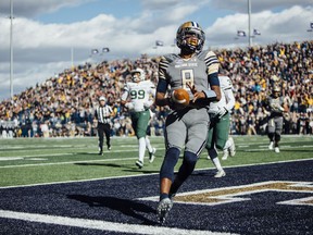 Montana State quarterback Chris Murray runs the ball for a touchdown against Portland State during the first half of an NCAA college football game at Bobcat Stadium, Saturday, Oct. 7, 2017, in Bozeman, Mont. (Adrian Sanchez-Gonzalez/Montana State University via AP)