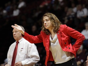 FILE - In this Saturday, March 17, 2012 file photo, Arkansas assistant coach Nicki Collen gestures during the first half of an NCAA tournament first-round college basketball game in College Station, Texas. Nicki Collen has been named head coach of the Atlanta Dream, it has been announced by owners Mary Brock and Kelly Loeffler, Monday, Oct. 30, 2017. (AP Photo/David J. Phillip, File)