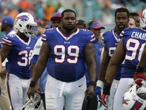 FILE - In this Sunday, Sept. 27, 2015 file photo, Buffalo Bills defensive tackle Marcell Dareus (99) walks the sidelines during the first half of an NFL football game against the Miami Dolphins in Miami Gardens, Fla. he Jacksonville Jaguars traded for Buffalo Bills nose tackle Marcell Dareus on Friday, Oct. 27, 2017, beefing up one of the NFL's best defenses. The Jaguars (4-3) sent a sixth-round pick in the 2018 draft to the Bills (4-2) on Friday in exchange for the 330-pound run-stopper who has a checkered past.(AP Photo/Lynne Sladky, File)