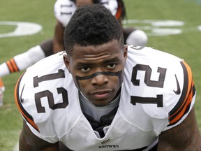 FILE - In this Dec. 21, 2014, file photo, Cleveland Browns' Josh Gordon (12) streteches before an NFL football game against the Carolina Panthers in Charlotte, N.C. Revealing he was "scared for my life," suspended Browns wide receiver Josh Gordon is making his case to be reinstated by the NFL. Gordon, who was indefinitely suspended by the league before the 2015 season following another violation of the league's substance-abuse policy, detailed his life-long drug abuse, the depths of his addiction and determination to turn his life around in a video released Tuesday, Oct. 10, 2017,  on "Uninterrupted," a media platform for athletes produced by NBA star LeBron James.  (AP Photo/Bob Leverone, File)