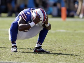 FILE - In this Sept. 17, 2017, file photo, Buffalo Bills' Tyrod Taylor reacts to an incomplete pass on fourth down in the final seconds in the second half of an NFL football game against the Carolina Panthers in Charlotte, N.C. In his third season as the Bills starter, Taylor has yet to prove he's capable of rallying the team once it falls behind by more than a field goal. Buffalo comes out of its bye preparing to host Tampa Bay on Sunday. ((AP Photo/Bob Leverone, File)