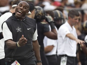 FILE - In this Oct. 7, 2017, file photo, Vanderbilt head coach Derek Mason yells to his players during the first half of an NCAA college football game against Georgia in Nashville, Tenn. The Commodores finally had a week off to rest up and catch their breath after a grueling month of ranked opponents. Now the big question is whether or not they can get back to how well they played when the season started as they prepare to visit South Carolina. (AP Photo/Mark Humphrey, File)
