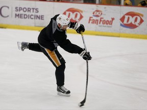 FILE - In this Sept. 7, 2017, file photo, Pittsburgh Penguins' Patric Hornqvist (72) works out during an informal on-ice workout at the NHL hockey team facility, in Cranberry, Pa. Hornqvist is a game-time decision to make his season debut for the Penguins when they visit the Washington Capitals. All signs point to Hornqvist playing Wednesday night, Oct. 11,2017, after missing the first three games of the season after surgery on his right hand. (AP Photo/Keith Srakocic, File)