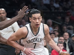 FILE - In this April 8, 2017, file photo, Brooklyn Nets guard Jeremy Lin (7) drives to the basket against the Chicago Bulls during the first half of an NBA basketball game, in New York. The Nets say Jeremy Lin has had surgery repair a ruptured patella tendon in his right knee and will miss the remainder of the season. The procedure was performed Friday morning, Oct. 20, 2017, at the Hospital for Special Surgery in New York. (AP Photo/Mary Altaffer, File)