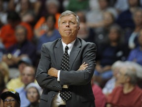 FILE - In this Aug. 30, 2016, file photo, San Antonio Stars coach Dan Hughes watches the team's WNBA basketball game against the Connecticut Sun in Uncasville, Conn. Hughes is coming back to the WNBA as coach of the Seattle Storm, multiple people with knowledge of the situation told The Associated Press. The people spoke on condition of anonymity Tuesday night, Oct. 3, 2017, because the team has not announced the move. Hughes spent 11 years as coach and general manager for San Antonio, guiding the Stars to six postseason appearances before retiring after the 2016 season. (AP Photo/Jessica Hill, File)