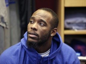 FILE - In this Jan. 5, 2017, file photo, New York Giants Dominique Rodgers-Cromartie talks to reporters in the locker room after NFL football practice in East Rutherford, N.J.  The Giants have suspended Rodgers-Cromartie, coach Ben McAdoo said Wednesday, Oct. 11, 2017. after practice without giving a reason. He said he had a meeting with 31-year-old on Tuesday night and Rodgers-Cromartie left the team on Wednesday. (AP Photo/Seth Wenig, File)