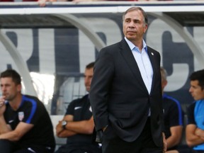 FILE- In this June 8, 2017, file photo, United States coach Bruce Arena watches during the first half of the team's World Cup soccer qualifying match against Trinidad & Tobago in Commerce City, Colo. A bumbling, stumbling, tumbling qualification campaign ended with a 2-1 loss to an already eliminated Caribbean nation. Now comes the fallout, which almost surely will lead to a new coach and possibly to a new head of the U.S. Soccer Federation. (AP Photo/David Zalubowski, File)
