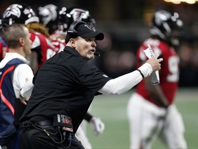 FILE - In this Sept. 17, 2017, file photo, Atlanta Falcons head coach Dan Quinn directs his players during the first of an NFL football game against the Green Bay Packers in Atlanta. The Falcons play the New York Jets on Sunday, in East Rutherford, N.J. (AP Photo/John Bazemore, File)