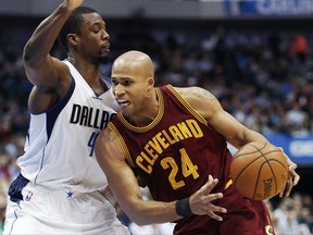 FILE - In this Monday, Jan. 30, 2017 file photo, Cleveland Cavaliers forward Richard Jefferson (24) battles Dallas Mavericks forward Harrison Barnes (40) for space during the first half of an NBA basketball game in Dallas. Their roster overloaded, the Cavaliers are trading Richard Jefferson and Kay Felder to save money. Cleveland has agreed to send Jefferson, Felder, two second-round draft picks and $3 million to the Atlanta Hawks in a move that will allow the Eastern Conference champions to avoid paying $12 million in luxury tax penalties, a person familiar with the deal told The Associated Press on Friday, Oct. 13, 2017. (AP Photo/Brandon Wade, File)