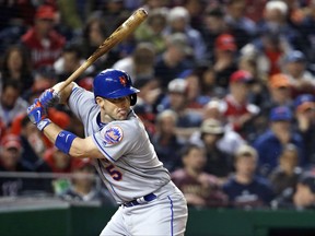 FILE - In this May 23, 2016, file photo, New York Mets' David Wright bats during the fifth inning of a baseball game against the Washington Nationals at Nationals Park in Washington. Wright underwent back surgery, his second operation in a month as he tries to return to the major leagues after an absence of 1 1/2 years. The team said Thursday, Oct. 5, 2017, that Wright had a procedure in Los Angeles called a laminotomy, which is a treatment for nerve compression in the spinal canal. (AP Photo/Alex Brandon, File)