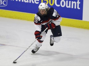 FILE - In this April 3, 2017, file photo, United States forward Amanda Kessel skates with the puck during the third period of a IIHF Women's World Championship hockey tournament game against Finland in Plymouth, Mich. Two-time Stanley Cup champion Phil Kessel and the Pittsburgh Penguins hosted the National Women's Hockey League's All-Star game in February. Olympian Amanda Kessel, his sister, scored a hat trick for the Metropolitan Riveters in the game. (AP Photo/Carlos Osorio, File)