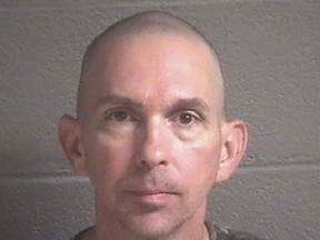 This undated photo provided by the Buncombe County Detention Center shows Michael Christopher Estes, who's accused of planting an improvised explosive device at the airport on Friday, Oct. 6, 2017, in Asheville, N.C. A criminal complaint in federal court accuses Estes of attempted malicious use of explosive materials and unlawful possession of explosives at the airport. (Buncombe County Detention Center via AP)
