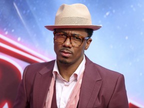 FILE - In this March 3, 2016, file photo, Nick Cannon arrives at the "America's Got Talent" Season 11 Red Carpet Kickoff at the Pasadena Civic Auditorium in Pasadena, Calif. Cannon said he won't apologize for his performance during a New Jersey Catholic university's homecoming. The Asbury Park Press reported officials at Georgian Court University, in Lakewood, say Cannon disregarded the terms of his contract and "crossed the line" with offensive words that do not represent the school's core values. (Photo by Rich Fury/Invision/AP, File)