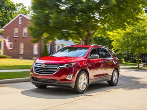 This photo provided by Chevrolet shows the 2018 Chevrolet Equinox. The Equinox comes standard with features both parents and teens will appreciate, from Android Auto and Apple CarPlay compatibility to Chevy's Teen Driver system, which acts as a watchdog when young drivers are behind the wheel. (AJ Mueller/Courtesy of Chevrolet via AP)