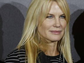 FILE - In this Oct. 22, 2015 file photo, actress Daryl Hannah attends a photocall of Netflix on-demand internet streaming media provider, prior to a news conference on the occasion of the provider's launch in Italy, in Milan. Hannah is speaking out, against Harvey Weinstein saying the movie mogul once tried to force his way into her hotel room.  Hannah and Annabella Sciorra are the latest in dozens of women who have spoken out against Weinstein. Allegations range from unwanted advances to rape. He has been ousted from his own company and expelled from the motion picture academy. A Weinstein spokeswoman did not immediately respond to a request for comment.  (AP Photo/Luca Bruno, File)