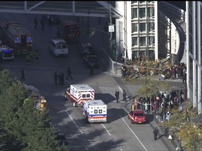 In this still image taken from video, police and ambulances respond to report of gunfire a few blocks from the World Trade Center in New York on Tuesday, Oct. 31, 2017. (AP Photo)